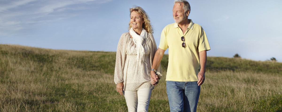 Mature couple walking in the nature