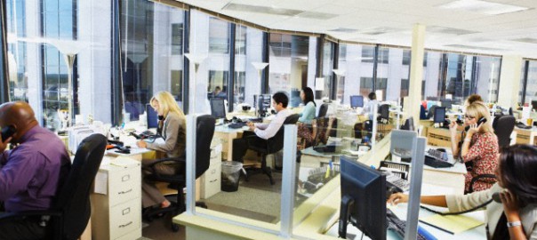 Busy office workers --- Image by © Artiga Photo/Corbis